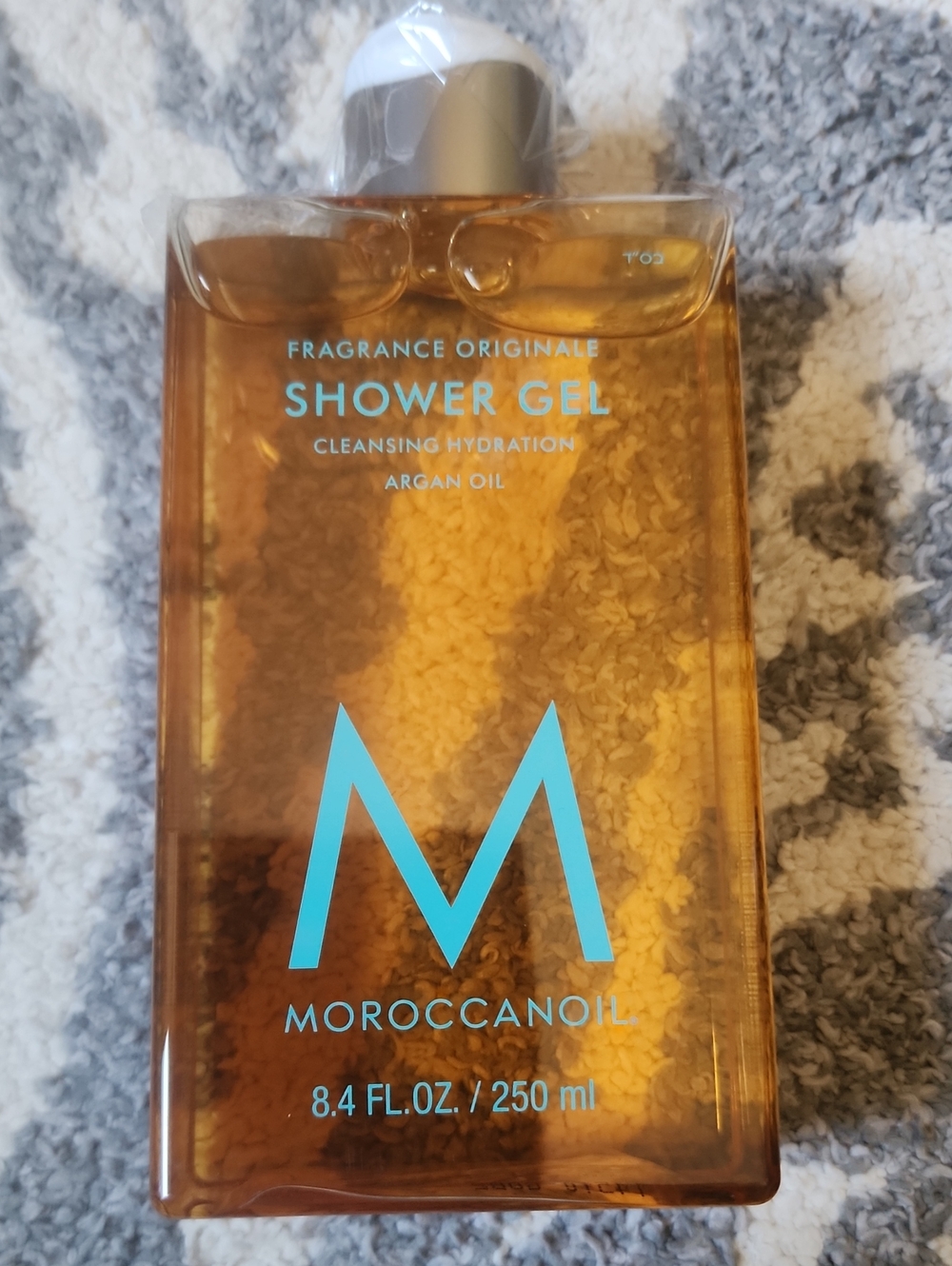 Moroccanoil Amber Body Wash Bottle with Turquoise Logo